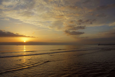 Scenic view of sea against sky during sunset