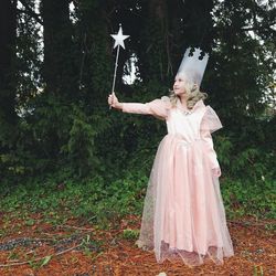 Girl standing with umbrella