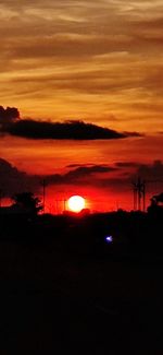 Scenic view of silhouette landscape against sky during sunset