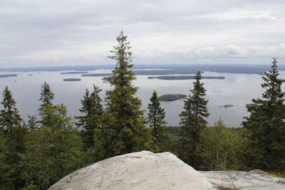 Scenic view of sea against cloudy sky