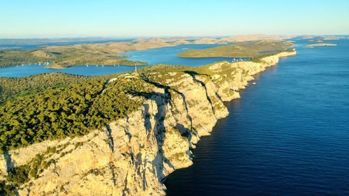 High angle view of bay against sky