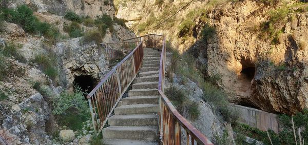 Staircase leading towards old mountains