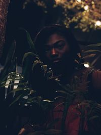 Portrait of young man looking up