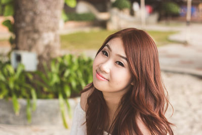 Portrait of a smiling young woman