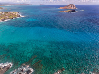 High angle view of sea and rocks