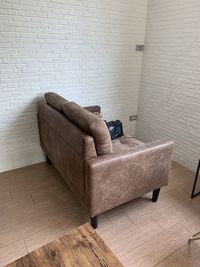 View of sofa on floor against wall at home
