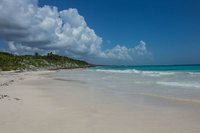 Scenic view of beach against sky