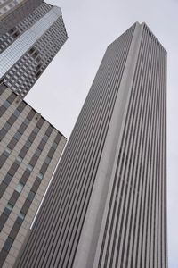 Low angle view of office building against sky