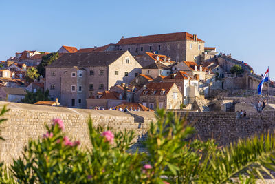 Old walls and towers in the historic old town of dubrovnik, croatia