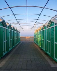 Beach huts against sky