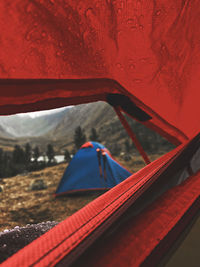 Close-up of tent against mountain range