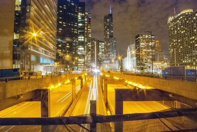 Light trails on city street at night