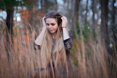 Portrait of teenage girl in forest