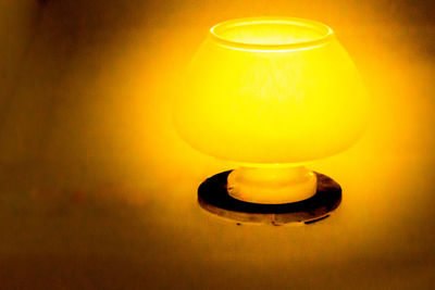 Close-up of illuminated light bulb