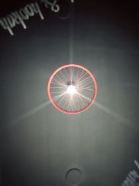 Low angle view of illuminated light