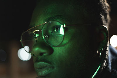 Close-up portrait of man wearing eyeglasses