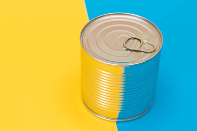 Close-up of equipment against yellow background