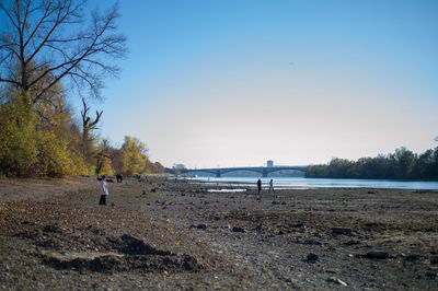 Man on beach against sky