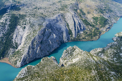 High angle view of rocks in sea