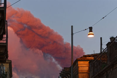 The sky at dawn during the eruption of etna from a via di riposto