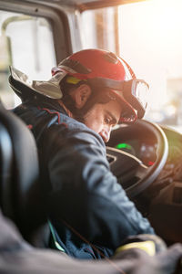 Rear view of man wearing hat