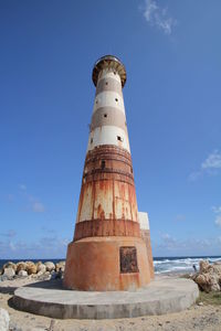 Low angle view of lighthouse against sky