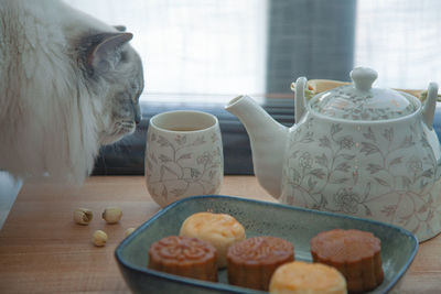 View of food and coffee cup on table