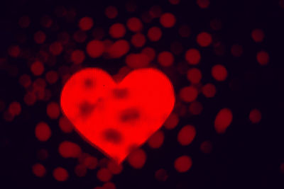 Close-up of heart shape against black background