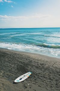 Scenic view of beach against sky