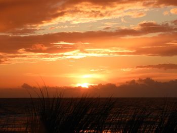 Scenic view of sunset over sea