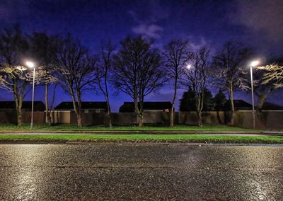 View of illuminated street at night