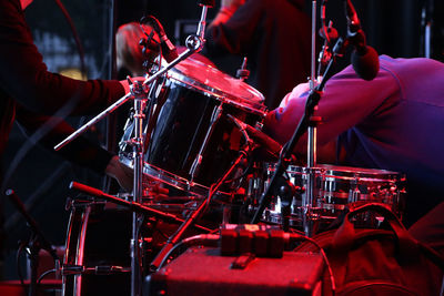 People playing drum on stage