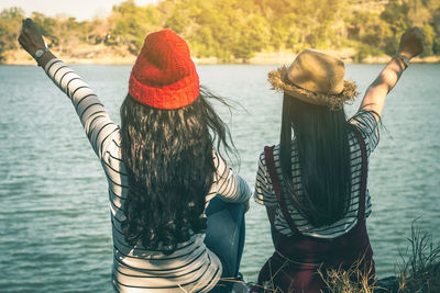 Rear view of women in river