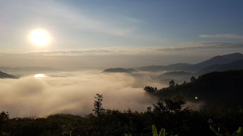 Scenic view of silhouette mountain against sky during sunset