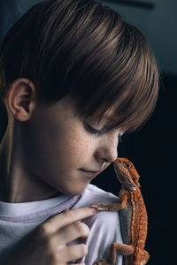 Close-up of boy looking away