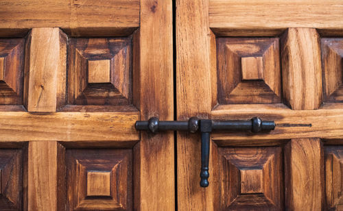 Close-up of wooden door of building