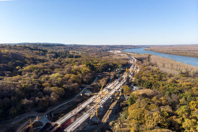 High angle view of road amidst landscape against clear sky