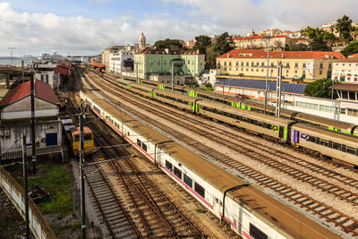 High angle view of train in city against sky