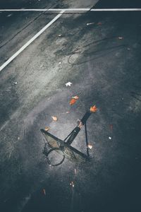 High angle view of basketball hoop reflecting on puddle