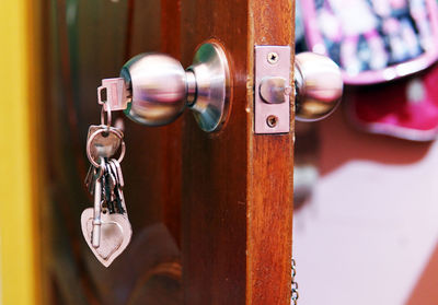 Close-up of chain hanging on door