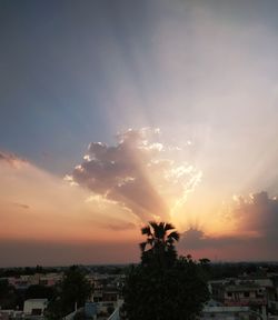 Panoramic view of townscape against sky during sunset