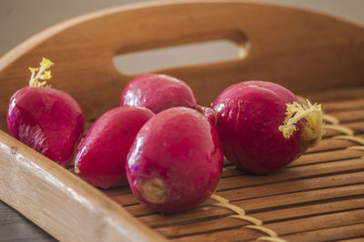 High angle view of fruits in basket on table