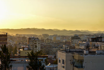 High angle view of townscape against sky during sunset