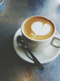 Close-up of coffee cup on table