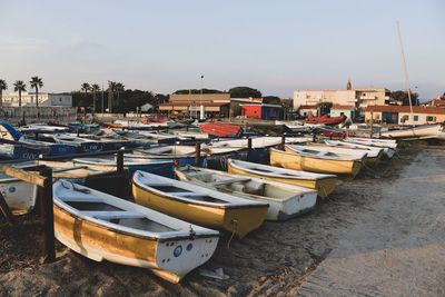 Boats moored at harbor