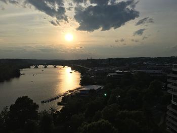 High angle view of city at sunset