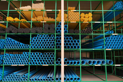 Pipes on rack at factory