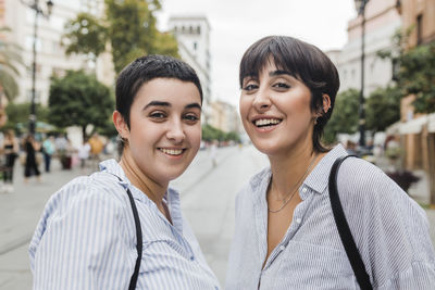 Happy lesbian couple with short hair