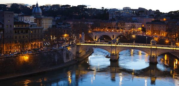 High angle view of tiber river in illuminated city