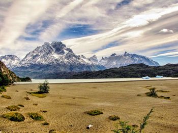 Scenic view of snowcapped mountains against sky